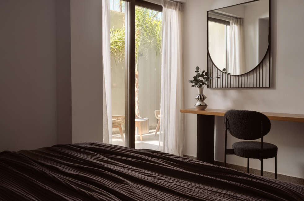 The lower level bedroom has access to a terrace & a separate entrance.