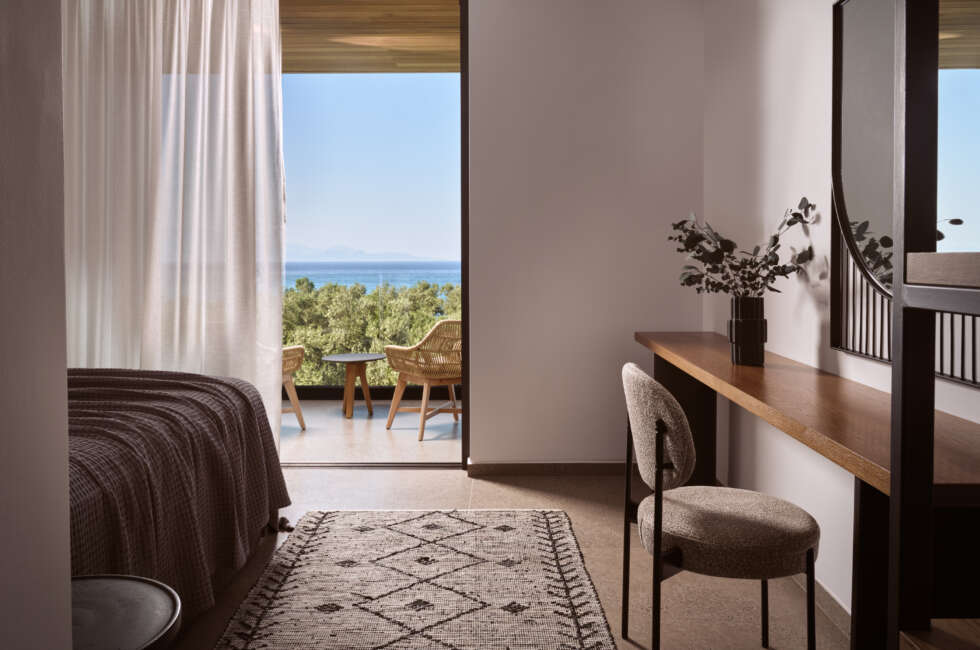 First Floor, second bedroom with direct access to a balcony with sea views.