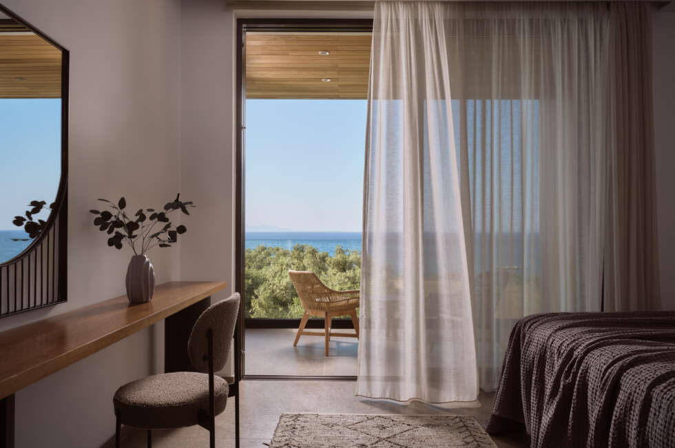 First Floor, third available bedroom also featuring sea views & access to a balcony.